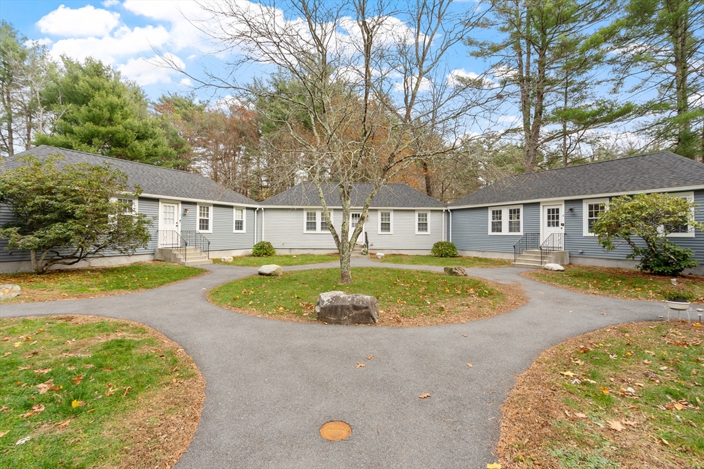 166 Parker Street, Unit 4 Maynard, MA 01754 - Photo 5 of 37 a view of outdoor space yard and swimming pool