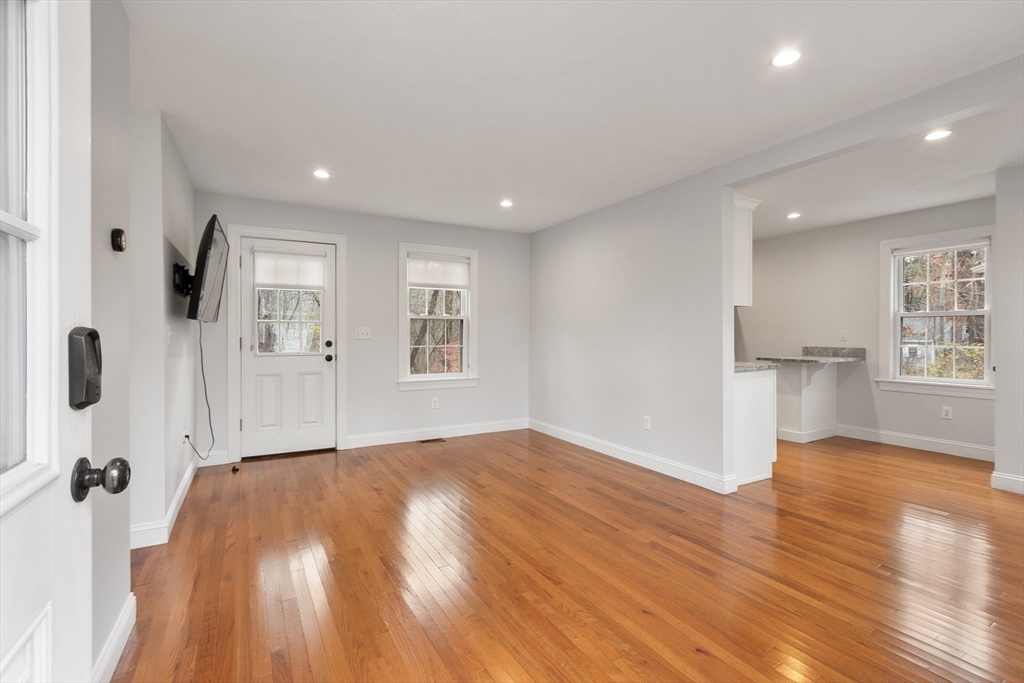 166 Parker Street, Unit 4 Maynard, MA 01754 - Photo 6 of 37 a view of an empty room and a window