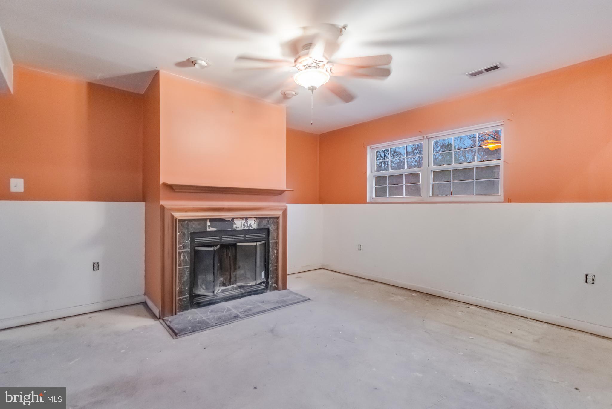 14107 Kydon Court Brandywine, MD 20613 - Photo 20 of 27 a view of an empty room with a fireplace