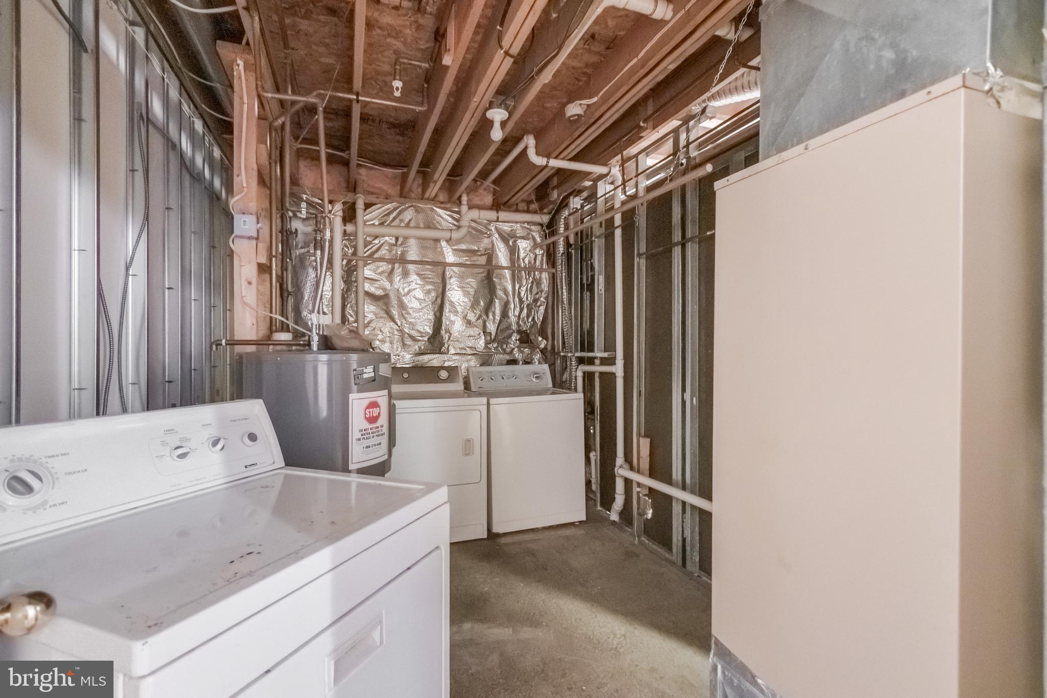 14107 Kydon Court Brandywine, MD 20613 - Photo 24 of 27 a utility room with dryer and washer