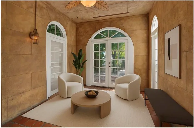 a living room with furniture and a window