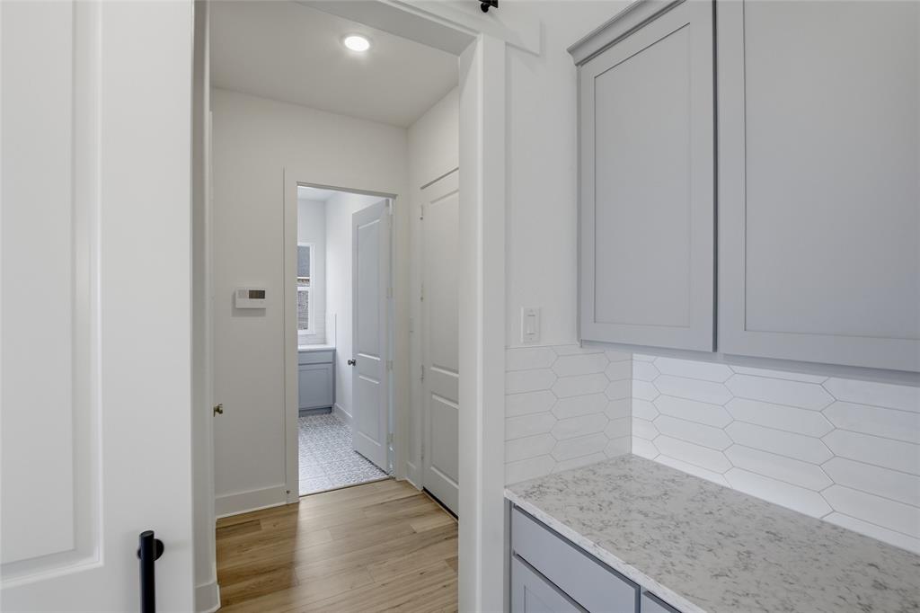 808 Vly Rdg Road Van Alstyne, TX 75495 - Photo 16 of 39 a view of hallway with wooden floor