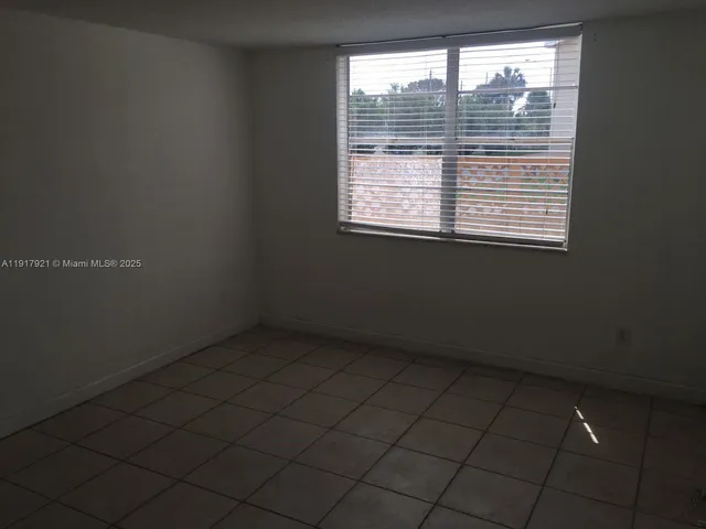 a bathroom with a toilet and a vanity