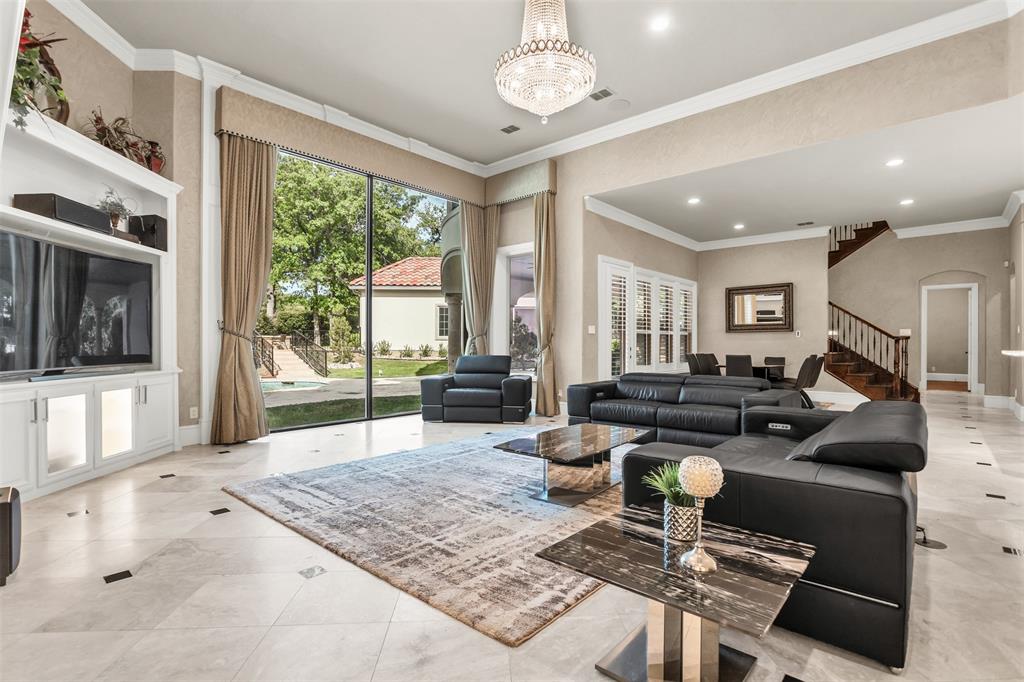 8600 Riviera Court Flower Mound, TX 75022 - Photo 13 of 40 a living room with furniture and a large window