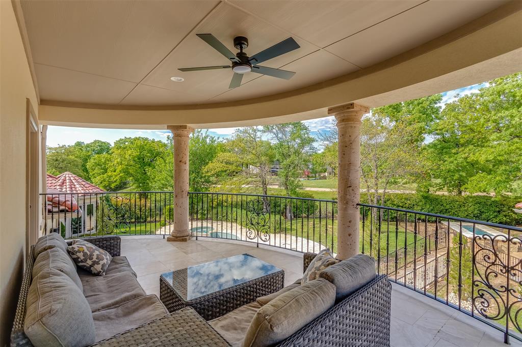 8600 Riviera Court Flower Mound, TX 75022 - Photo 21 of 40 a living room with furniture and a floor to ceiling window
