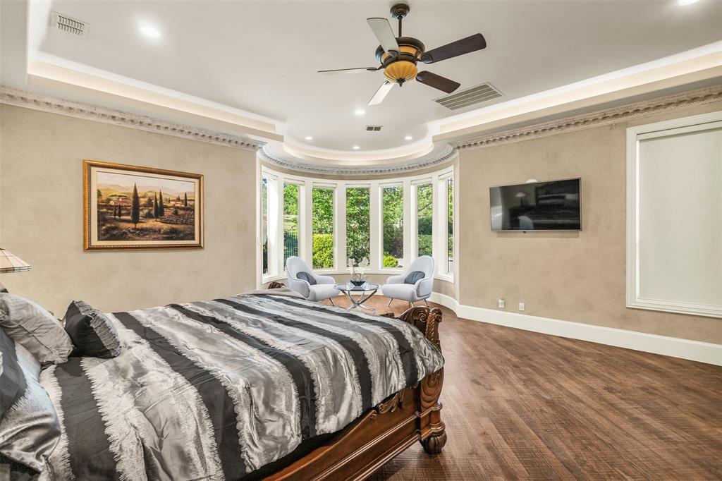 8600 Riviera Court Flower Mound, TX 75022 - Photo 25 of 40 a bedroom with a bed and a window