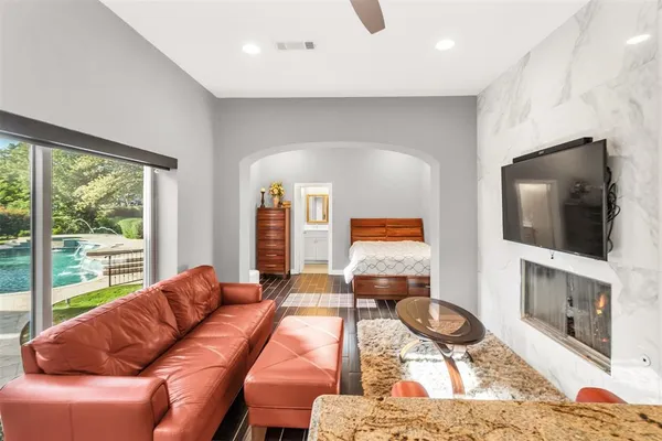 a kitchen with stainless steel appliances granite countertop a stove and a refrigerator