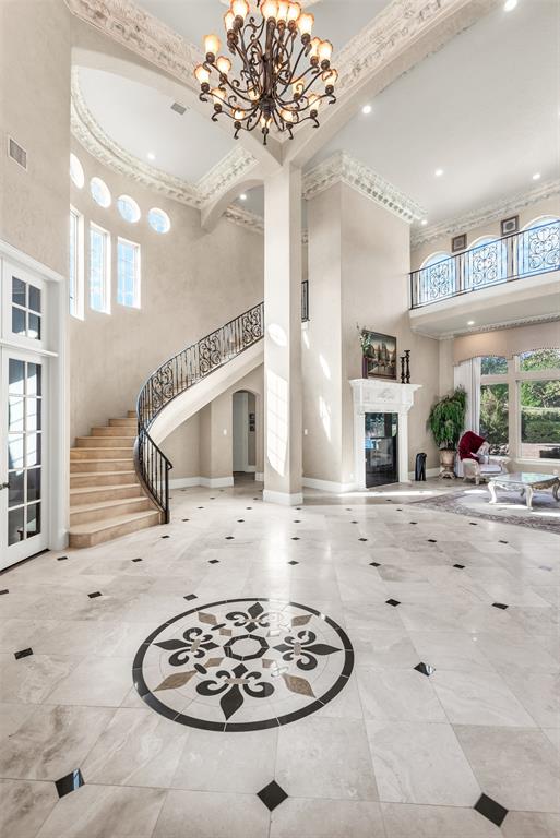 8600 Riviera Court Flower Mound, TX 75022 - Photo 5 of 40 a view of a living room and a fireplace