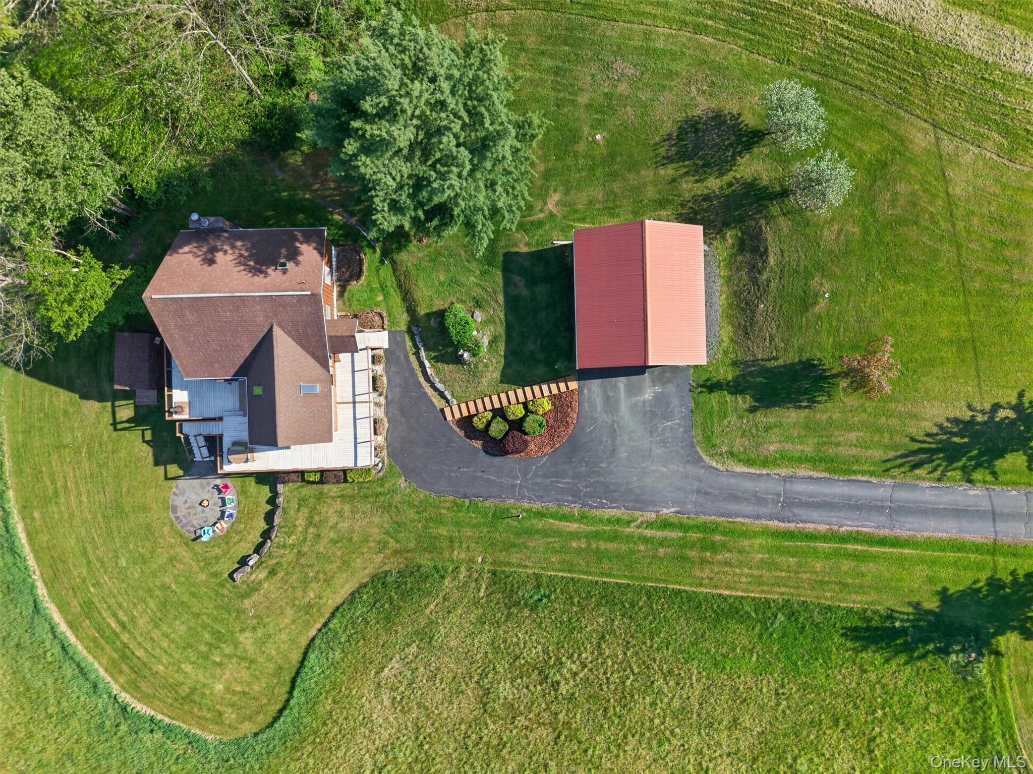 340 Hospital Road Callicoon, NY 12723 - Photo 31 of 41 an aerial view of a house with pool yard and outdoor seating