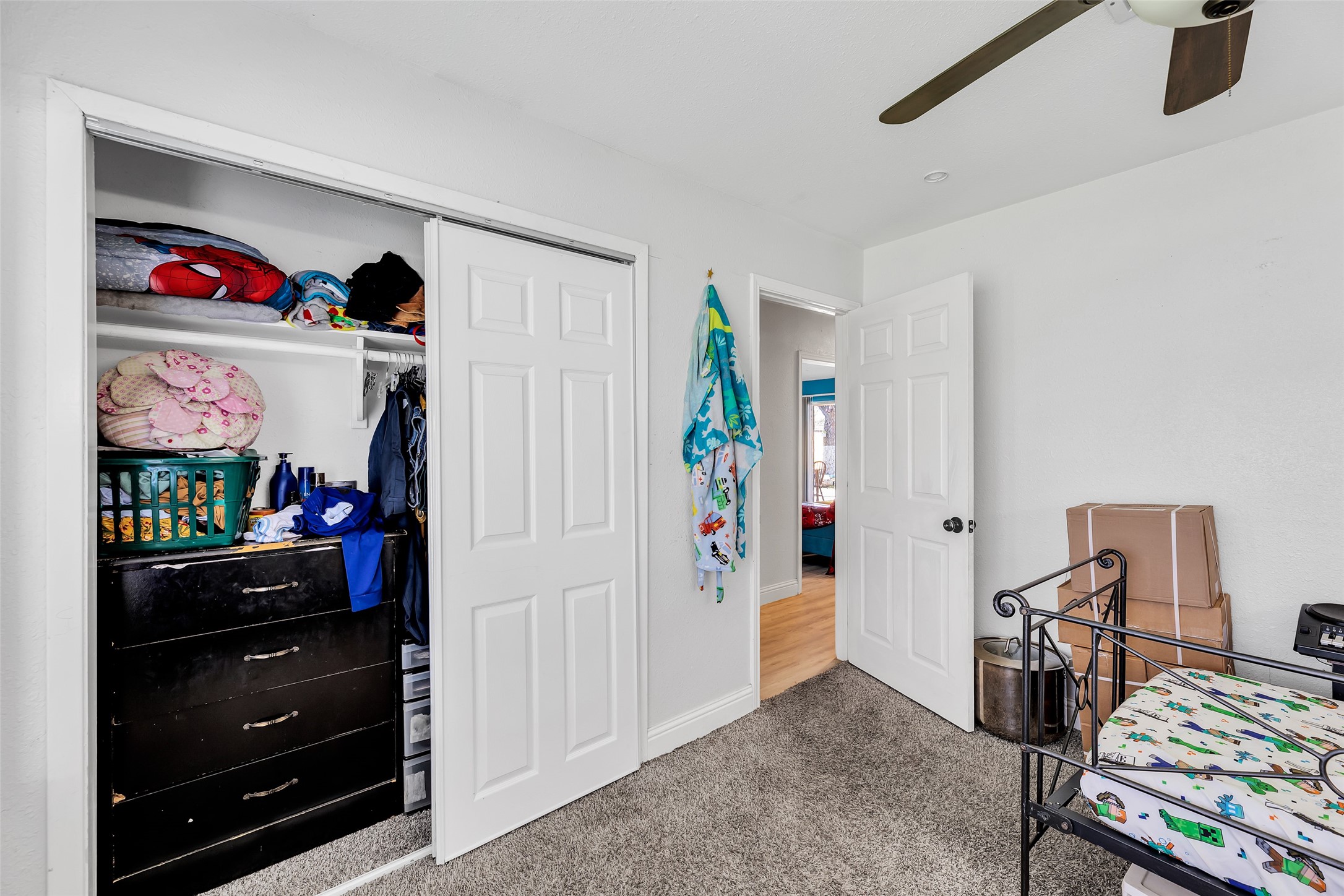 819 Hackberry Street Stafford, TX 77477 - Photo 15 of 23 a view of room with furniture and closet