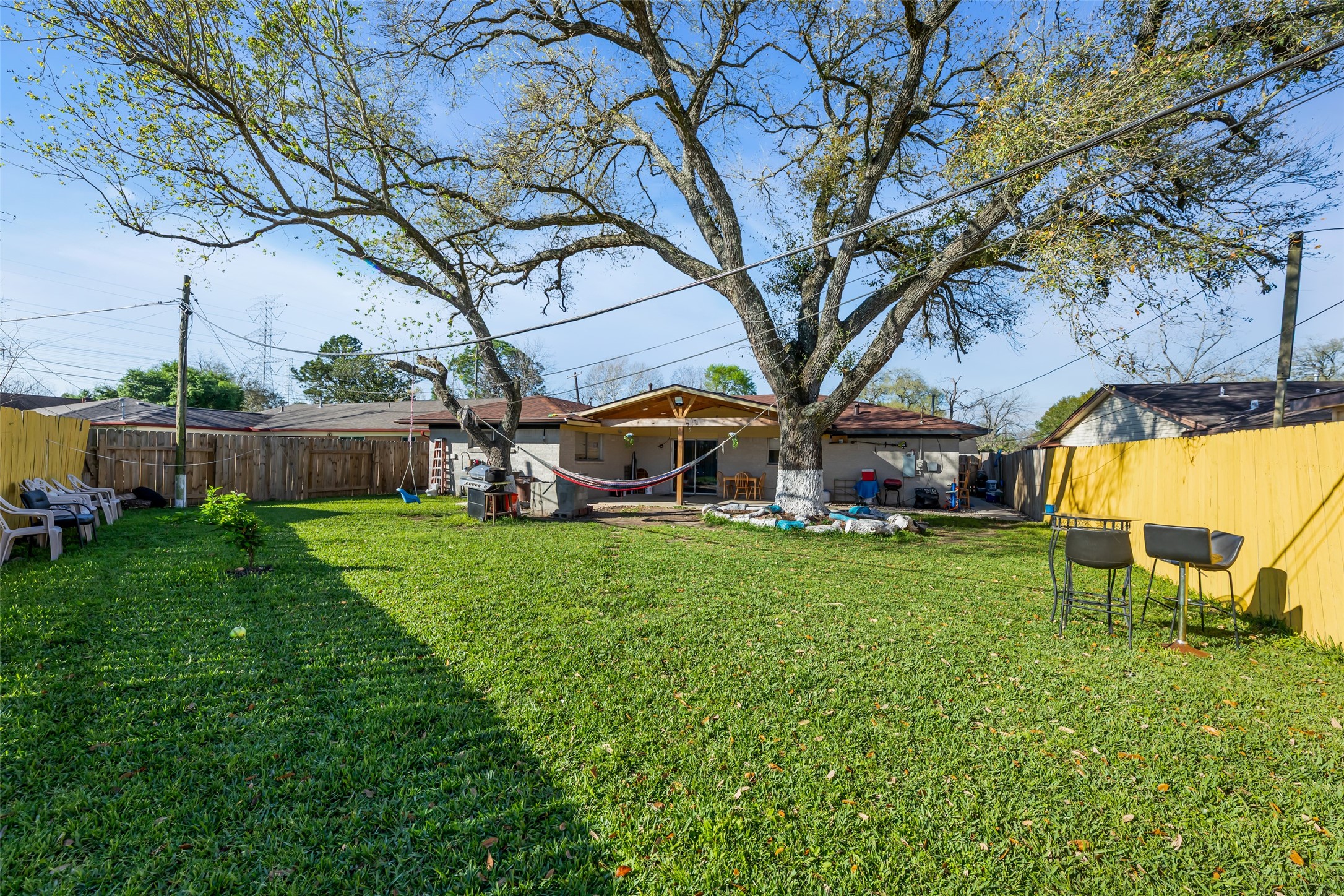 819 Hackberry Street Stafford, TX 77477 - Photo 22 of 23 a view of a garden with a slide