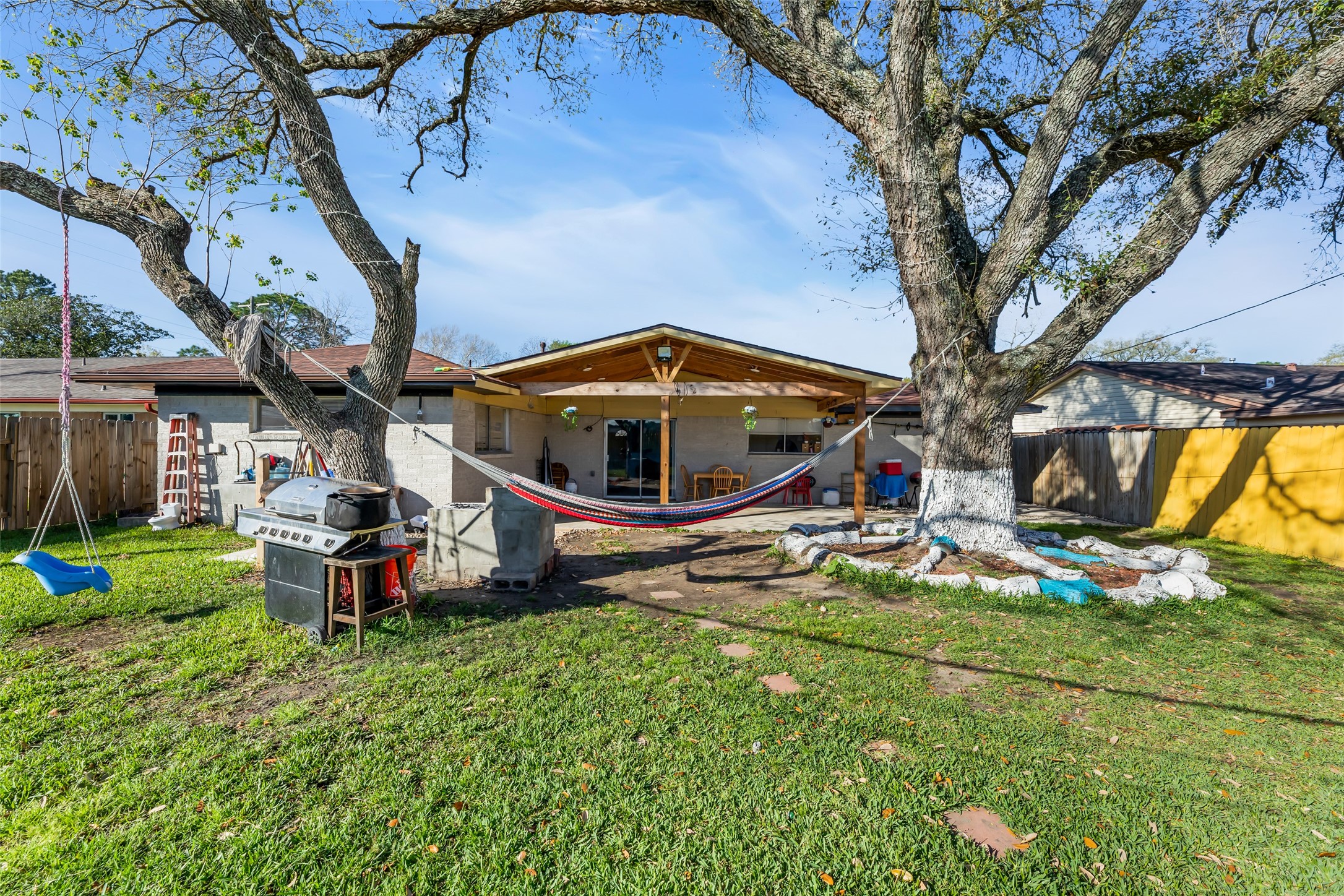 819 Hackberry Street Stafford, TX 77477 - Photo 23 of 23 a view of a house with backyard