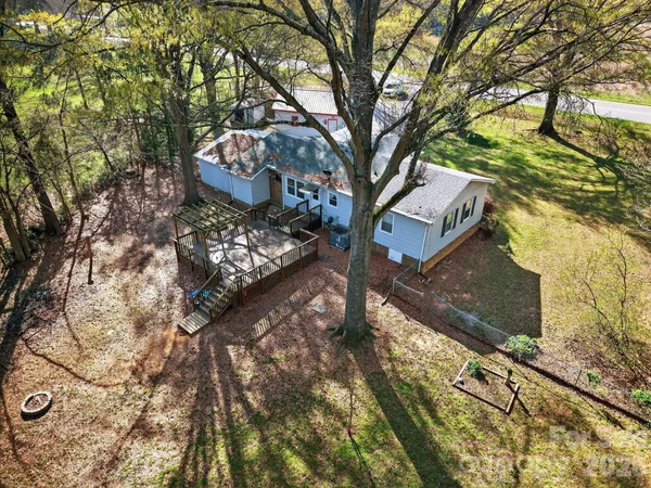 a front view of house with yard and seating area