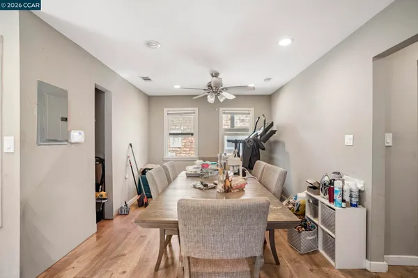 a dining room with furniture and window