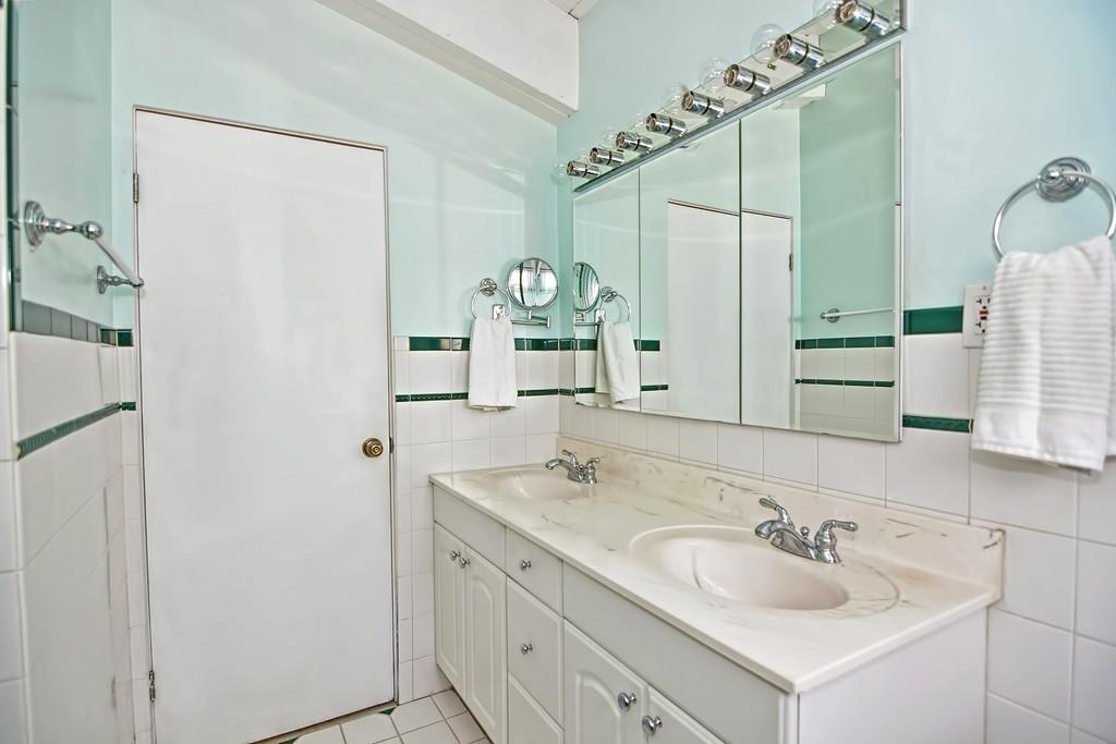 45 Walnut Street Millis, MA 02054 - Photo 19 of 32 a bathroom with a sink and a mirror