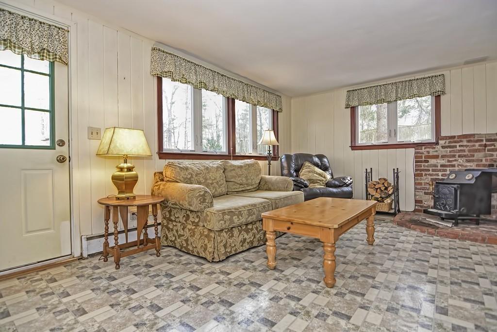45 Walnut Street Millis, MA 02054 - Photo 20 of 32 a living room with furniture and a fireplace