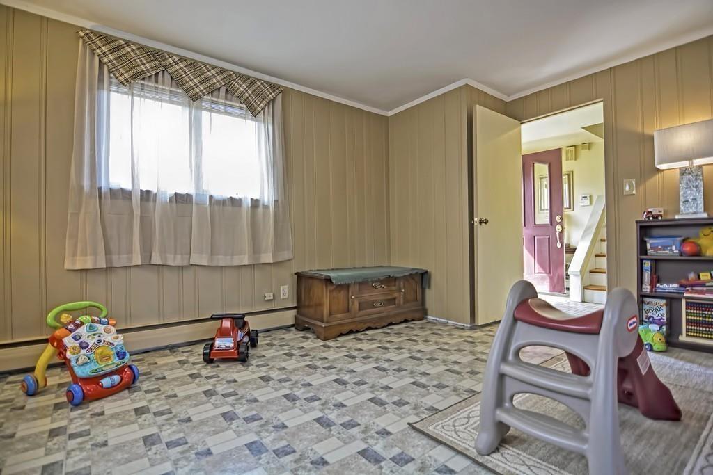 45 Walnut Street Millis, MA 02054 - Photo 23 of 32 a bedroom with furniture and a window