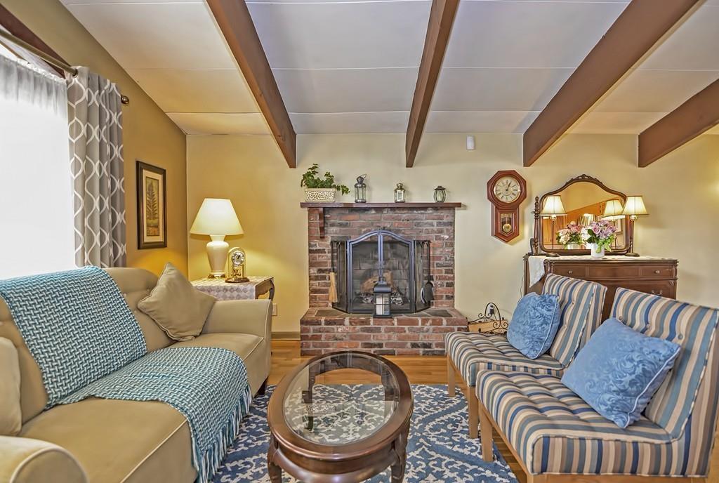 45 Walnut Street Millis, MA 02054 - Photo 4 of 32 a living room with furniture and a fireplace