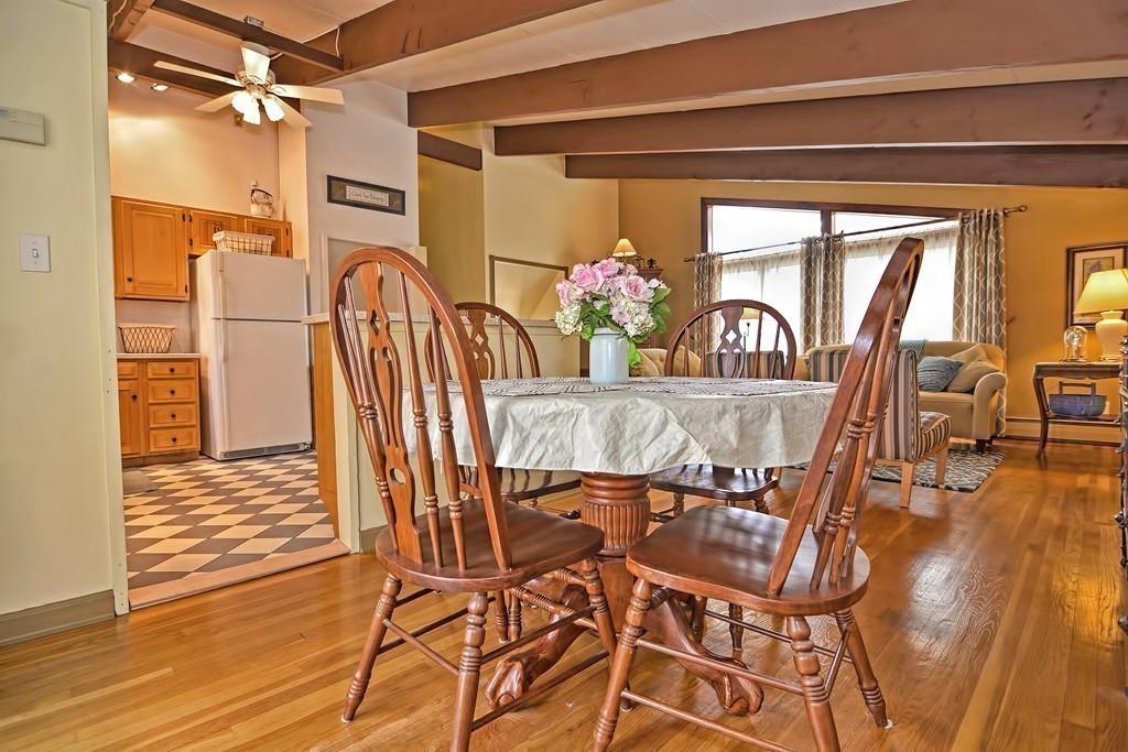 45 Walnut Street Millis, MA 02054 - Photo 6 of 32 a view of a dining room with furniture window and wooden floor
