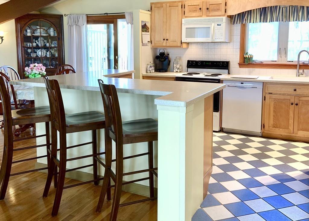 45 Walnut Street Millis, MA 02054 - Photo 8 of 32 a kitchen with a stove a sink and a refrigerator