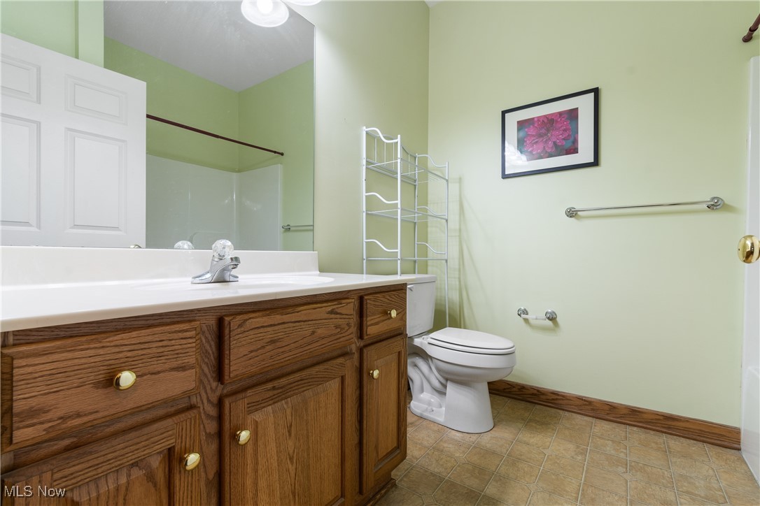 7030 Knight Avenue Northwest Canton, OH 44708 - Photo 19 of 26 Bathroom featuring vanity and toilet