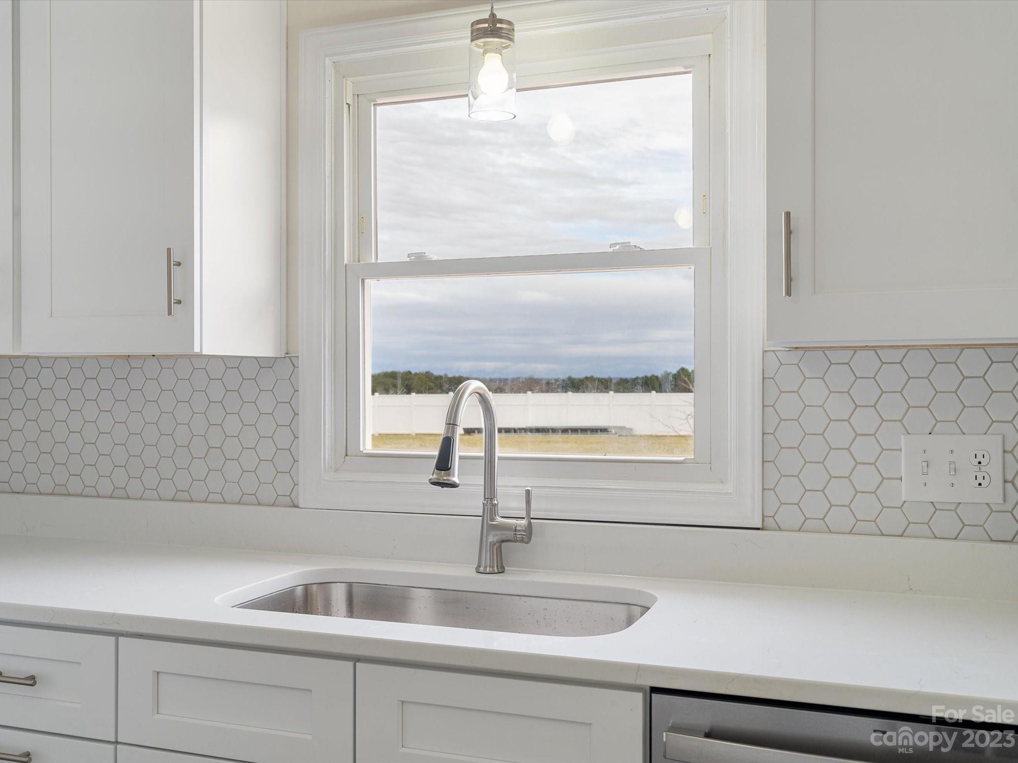 158 Baxter Road Cherryville, NC 28021 - Photo 14 of 38 a kitchen with a sink and a window