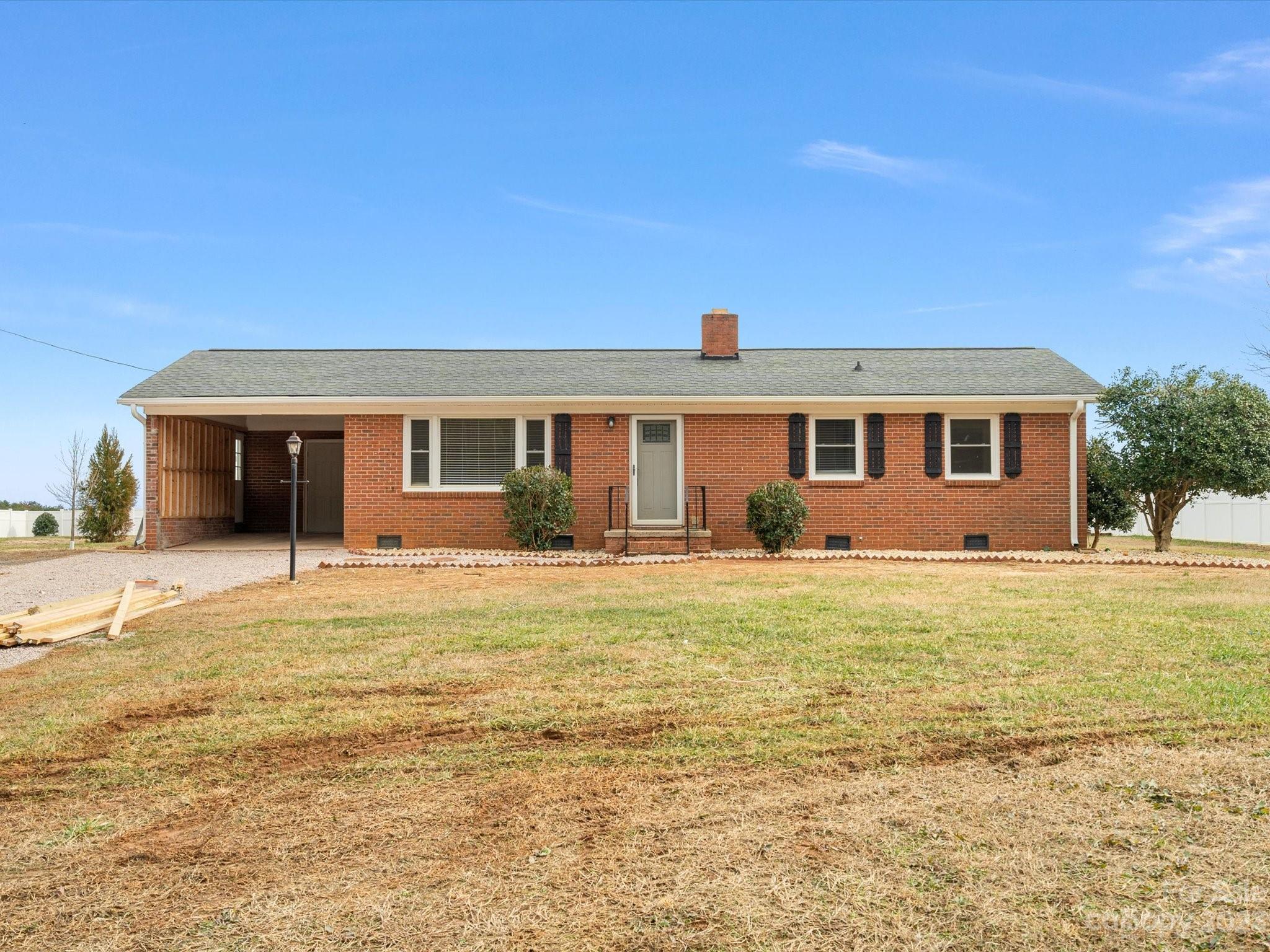 158 Baxter Road Cherryville, NC 28021 - Photo 2 of 38 a front view of a house with swimming pool