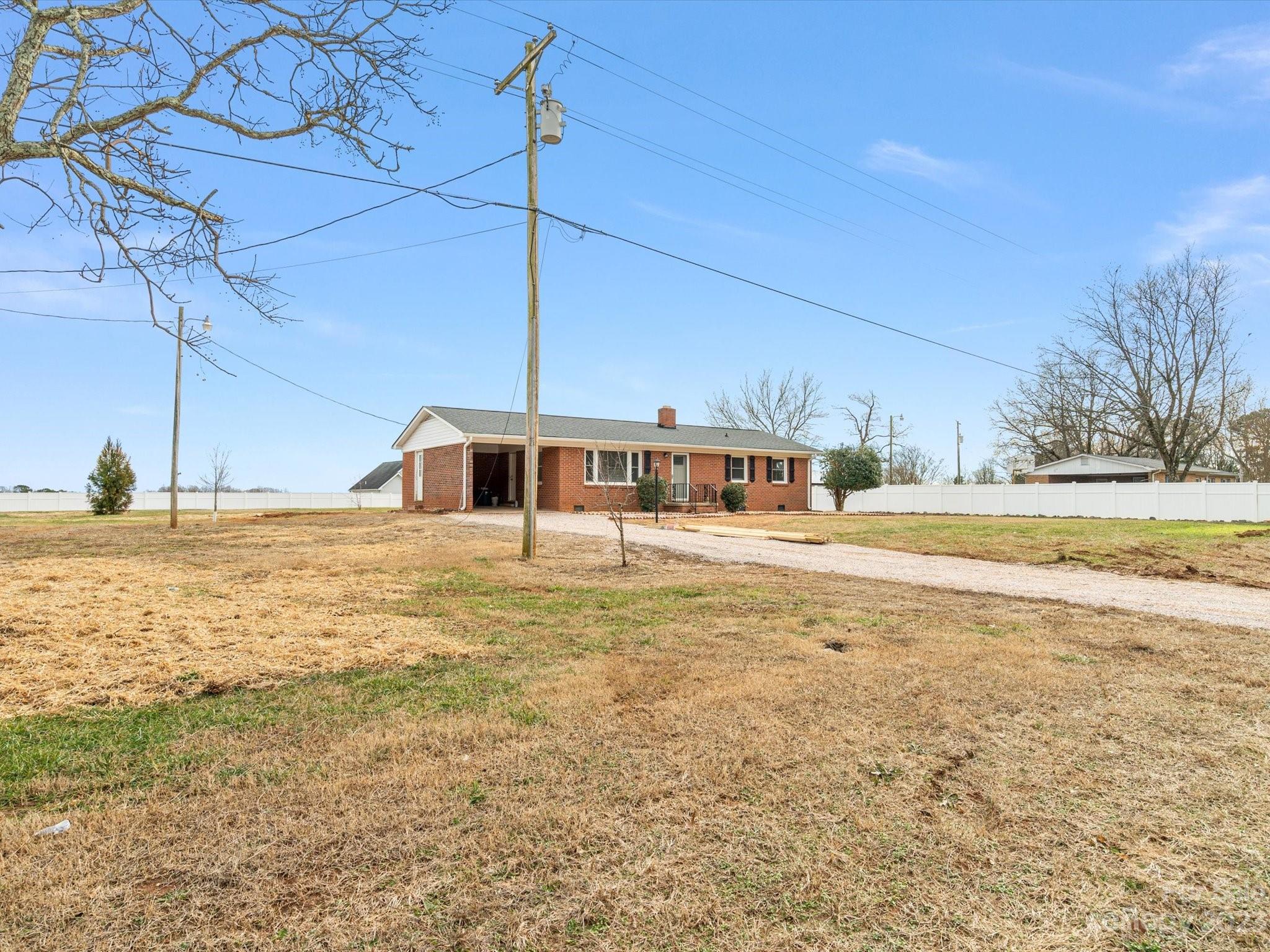 158 Baxter Road Cherryville, NC 28021 - Photo 36 of 38 a house view with a swimming pool
