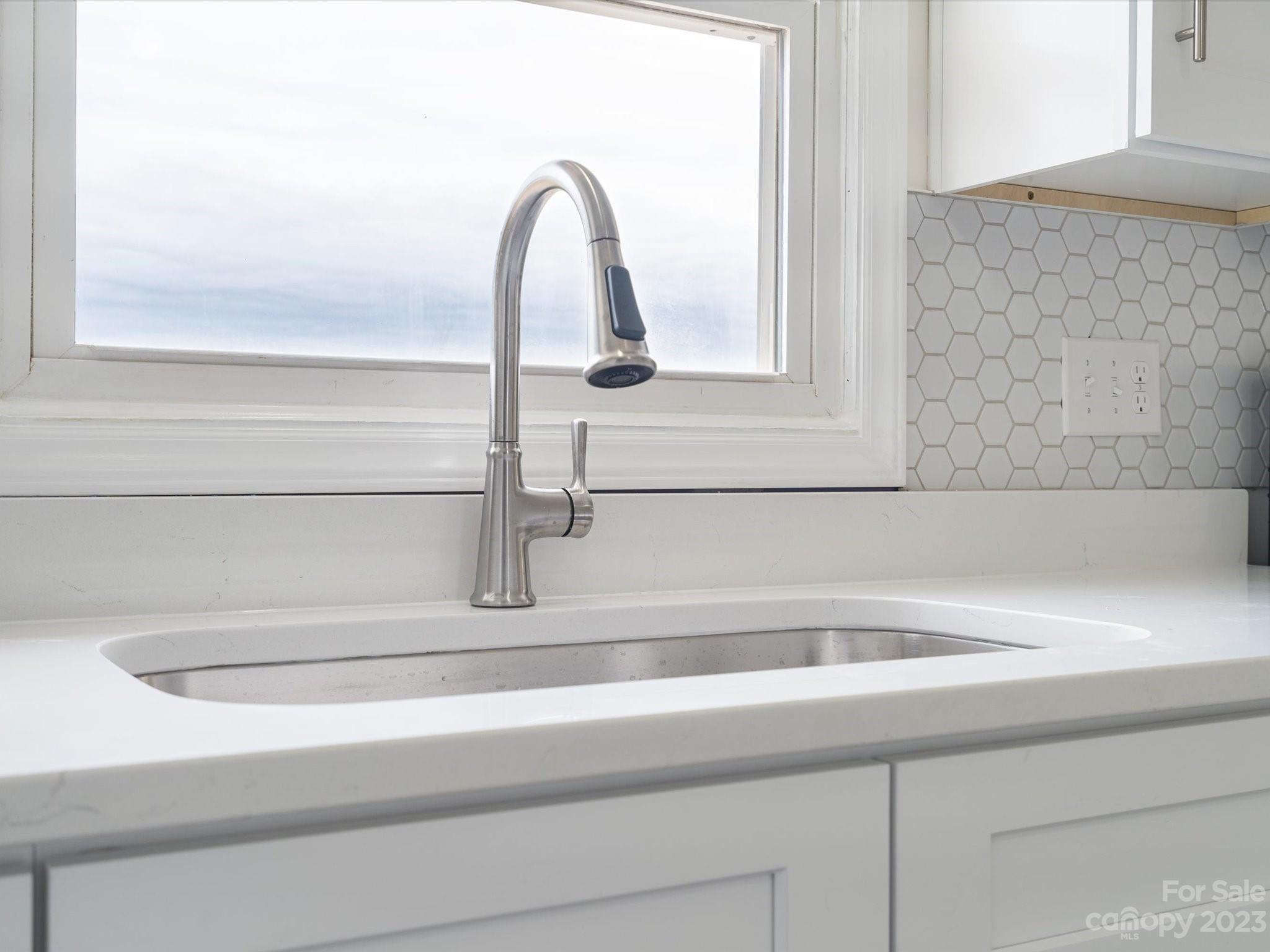 158 Baxter Road Cherryville, NC 28021 - Photo 10 of 38 a close view of sink and tap