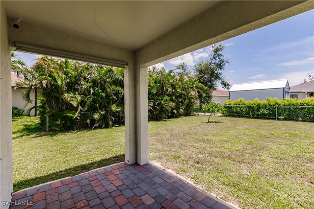 a view of a room with a large window