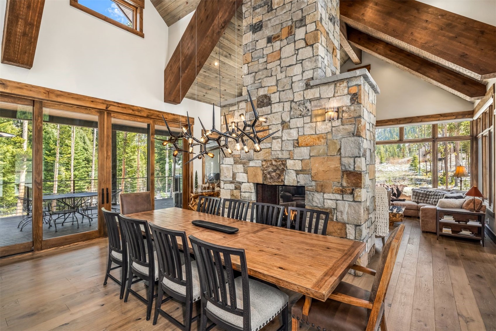 99 Independence Lane Keystone, CO 80435 - Photo 11 of 50 a view of a dining room with furniture window and wooden floor