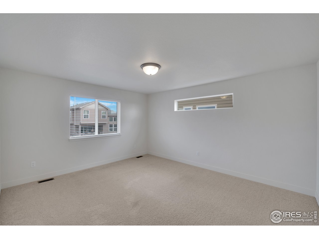 931 Milner Pass Road Severance, CO 80550 - Photo 17 of 34 Upstairs Primary Bedroom.