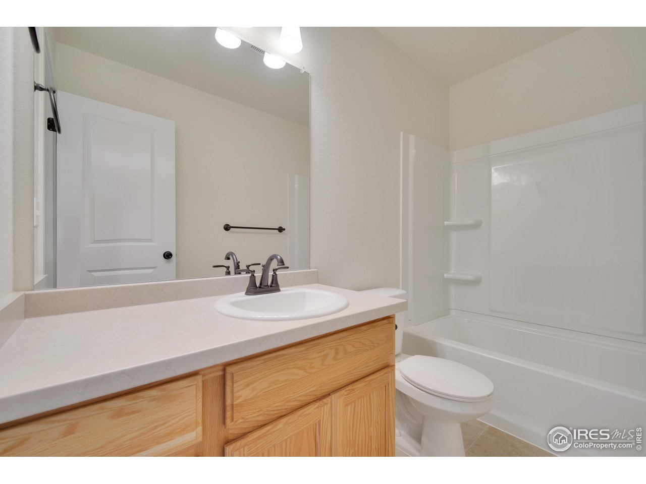 931 Milner Pass Road Severance, CO 80550 - Photo 26 of 34 Upstairs Full Bath for Bedrooms 2 and 3. Shower/Tub Combo.