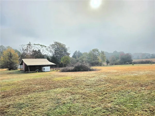 a view of a large pool with an ocean beach