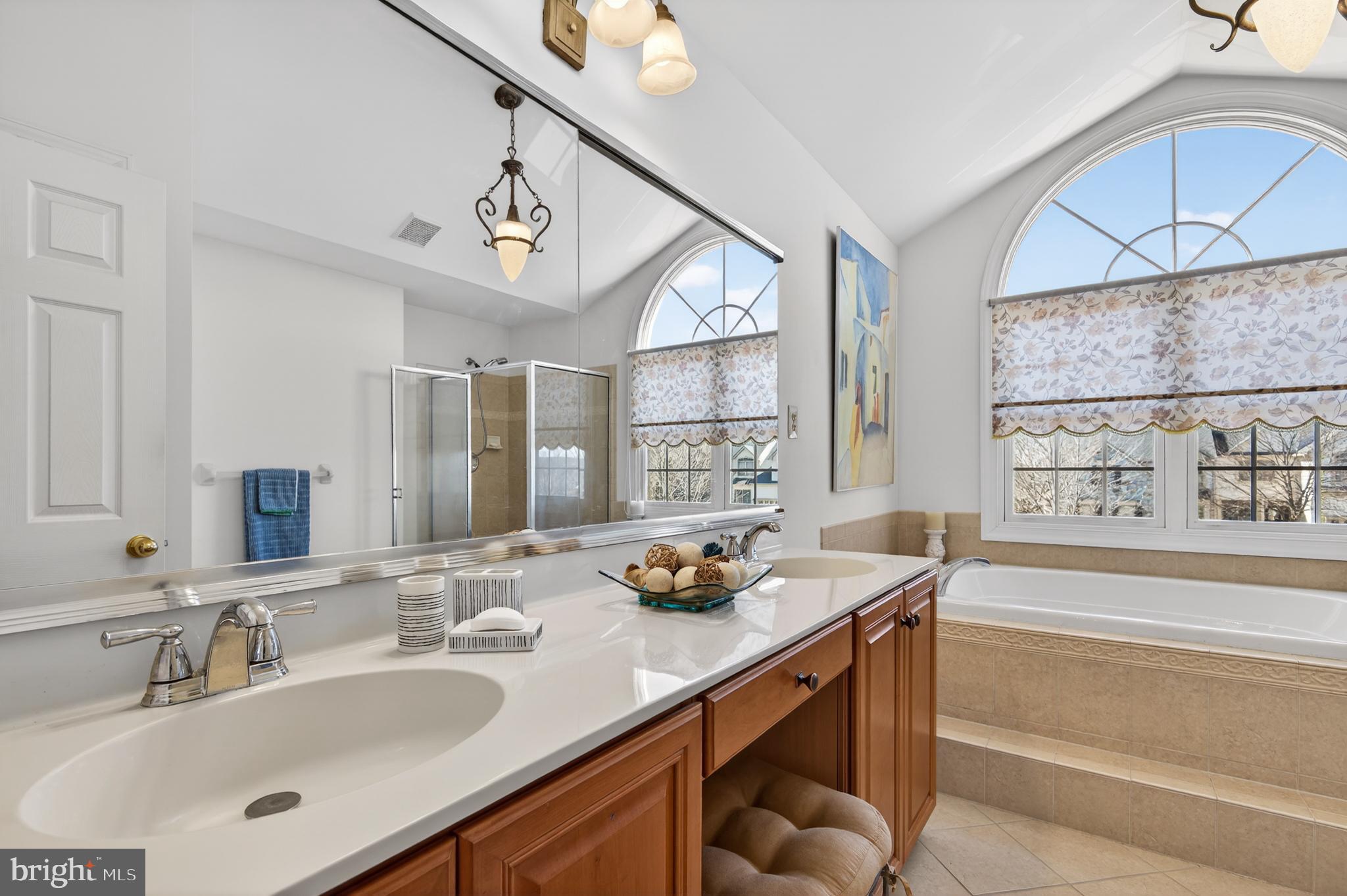 98 Granville Way Exton, PA 19341 - Photo 24 of 35 a bathroom with a sink double vanity and a bathtub