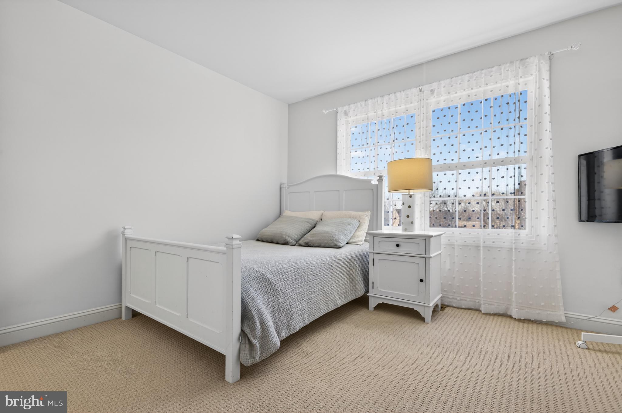 98 Granville Way Exton, PA 19341 - Photo 29 of 35 a room with a bed and a window