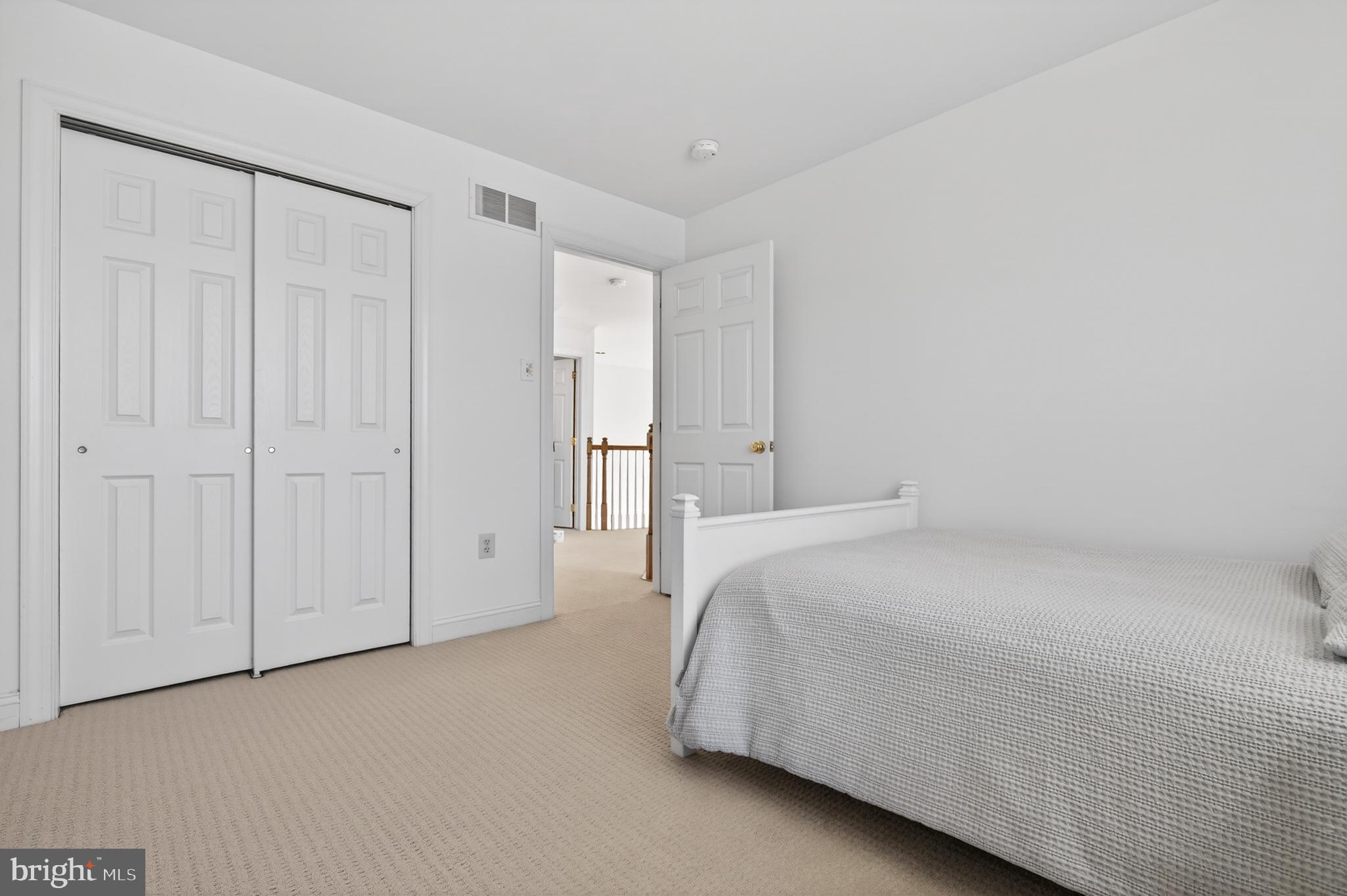 98 Granville Way Exton, PA 19341 - Photo 30 of 35 a room with a bed and white doors