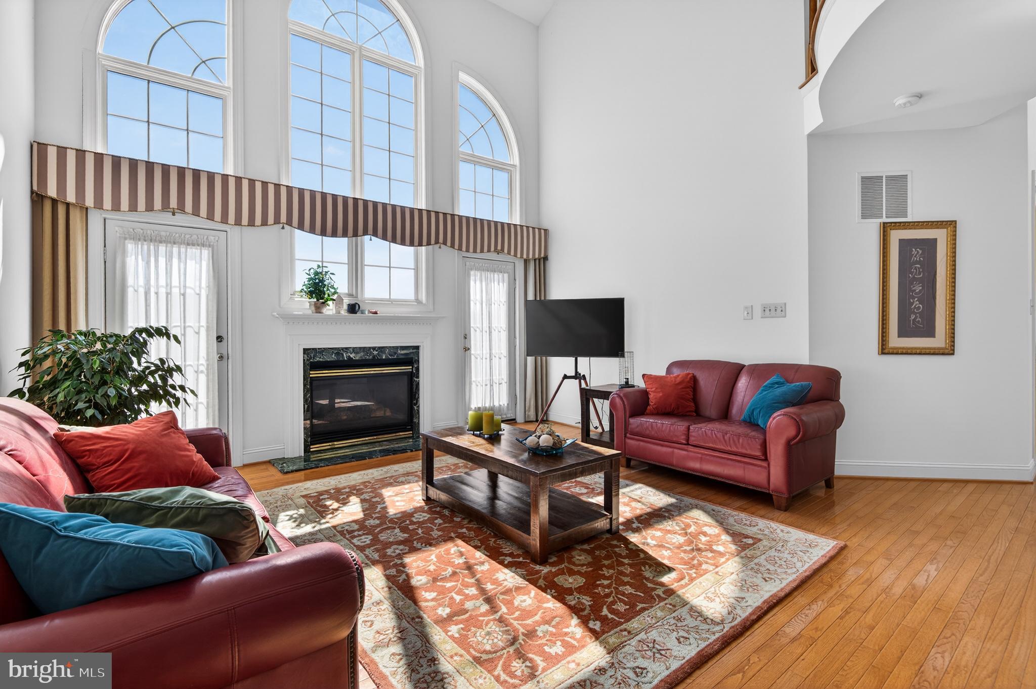 98 Granville Way Exton, PA 19341 - Photo 9 of 35 a living room with furniture and a fireplace