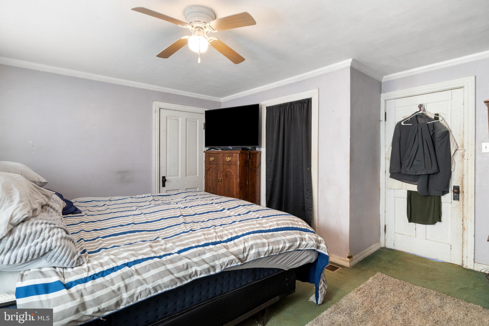 31 West Hanover Street Spring Grove, PA 17362 - Photo 20 of 31 a bedroom with a bed and a walk in closet