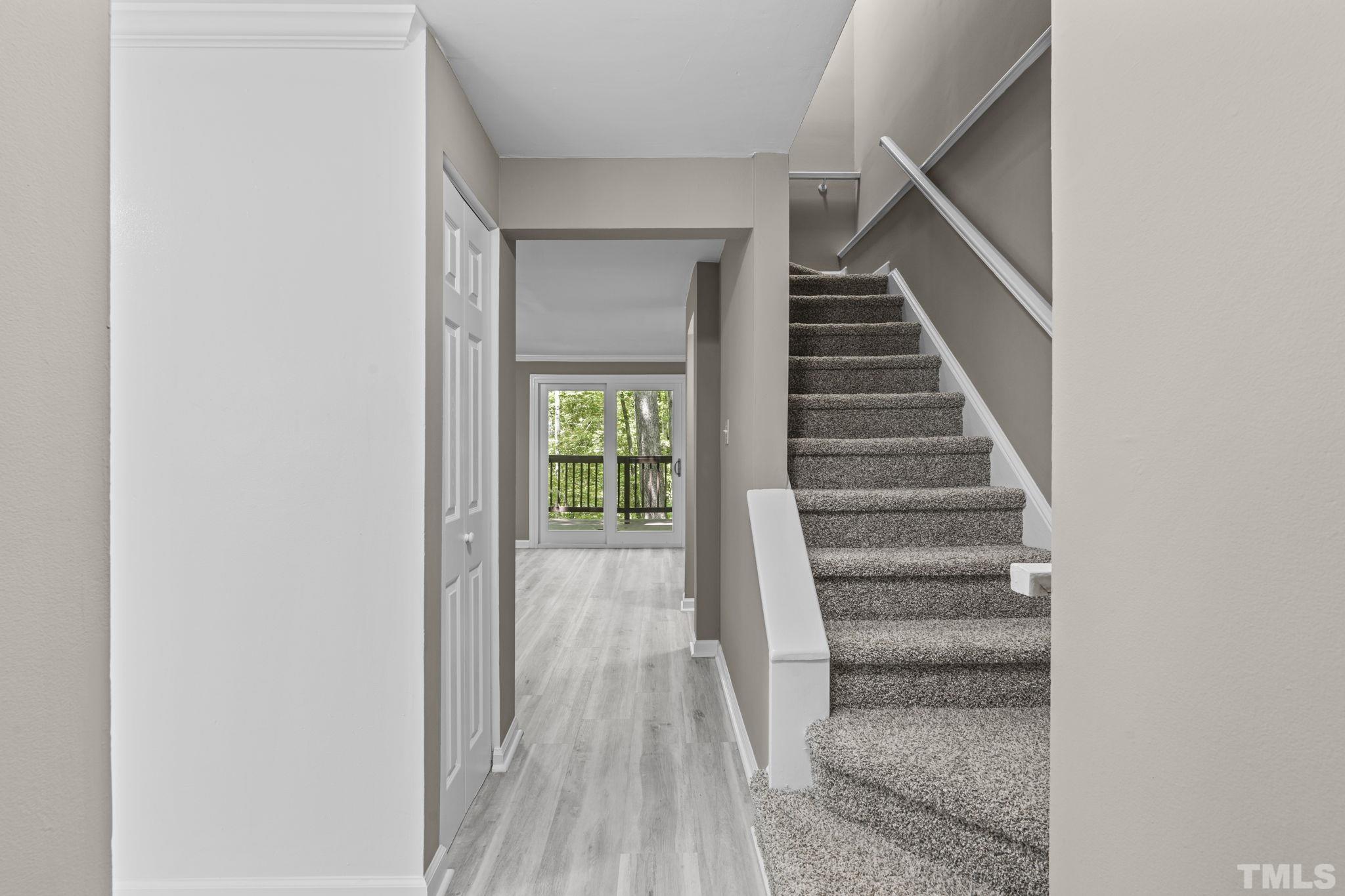7282 Shellburne Drive Raleigh, NC 27612 - Photo 5 of 34 a view of entryway with wooden floor