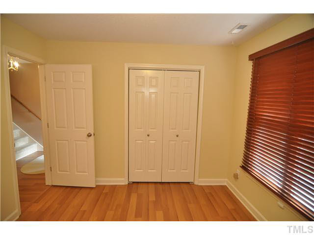 2202 Alpine Road Durham, NC 27707 - Photo 13 of 25 ANOTHER VIEW OF DOWNSTAIRS BEDROOM OR OFFICE SPACE..NOTICE PLENTY OF CLOSET SPACE!