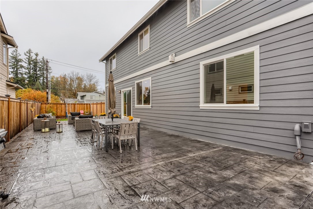 11427 Southeast 162nd Street Renton, WA 98055 - Photo 22 of 25 a view of a outdoor space with a patio and outdoor seating