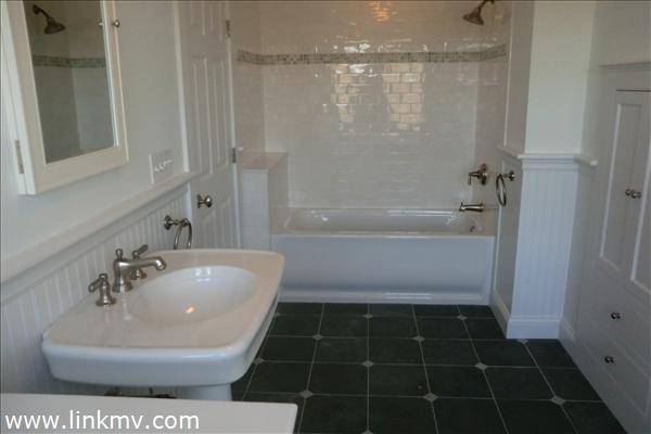 200 Katama Road Edgartown, MA 02539 - Photo 8 of 26 a bathroom with a sink a toilet and shower
