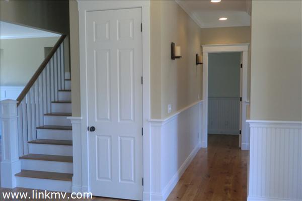 200 Katama Road Edgartown, MA 02539 - Photo 10 of 26 a view of a hallway with wooden floor and entryway