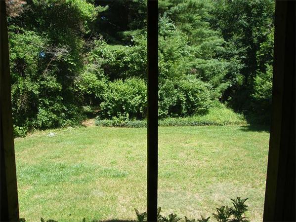 12 Meadow Road Townsend, MA 01469 - Photo 12 of 13 a view of a garden from a window
