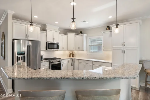 $589,900 | 8983 Mango Bay Court Northeast, Leland, NC 28451