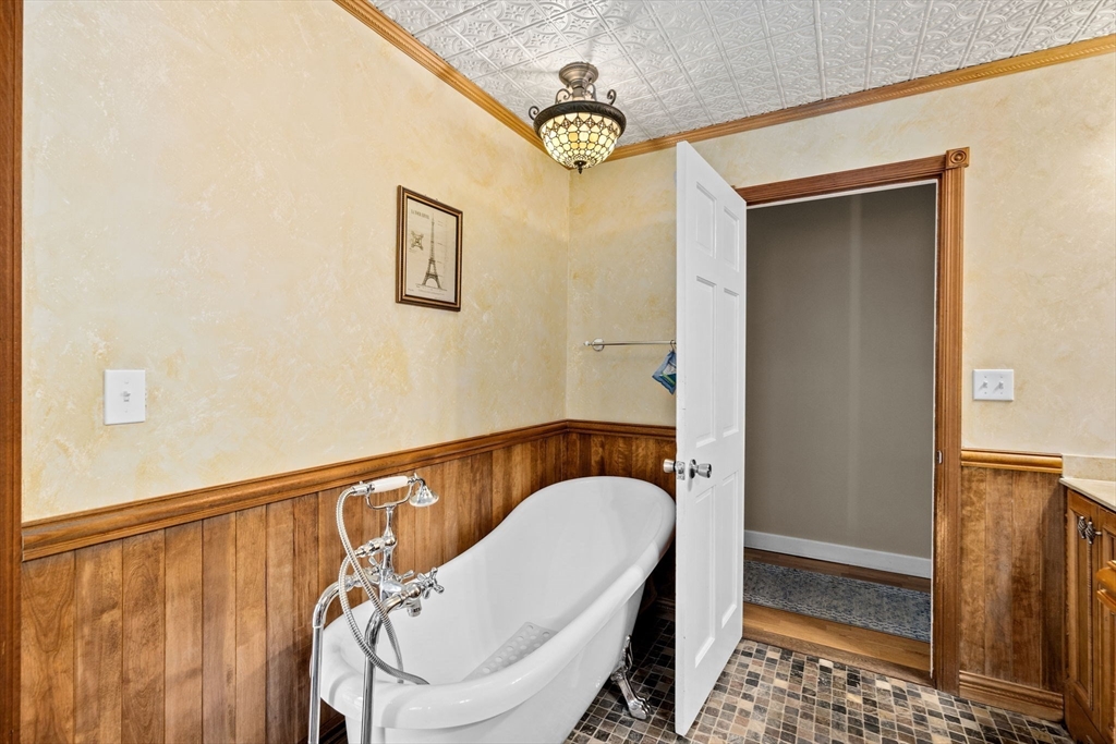 39 High Street Freetown, MA 02702 - Photo 19 of 42 a bathroom with a sink and a mirror