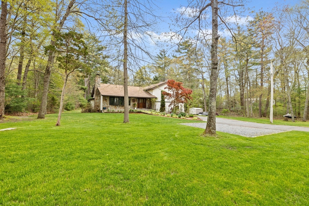 39 High Street Freetown, MA 02702 - Photo 2 of 42 a view of a house with a yard