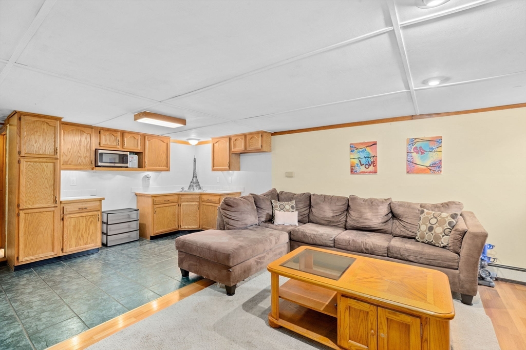 39 High Street Freetown, MA 02702 - Photo 24 of 42 a living room with furniture and a couch