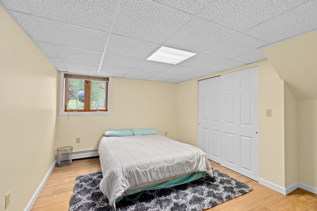 39 High Street Freetown, MA 02702 - Photo 27 of 42 a bedroom with a bed and a window